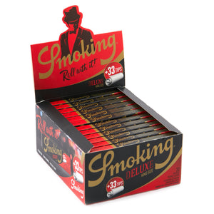 Smoking Deluxe kingsize slim rolling papers + Tips.